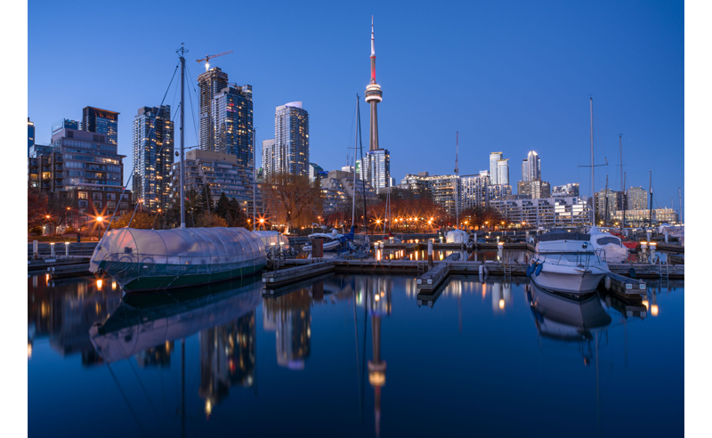Hasselblad XCD 25V sample image of docked boats with clear water forground and Toronto city scape background