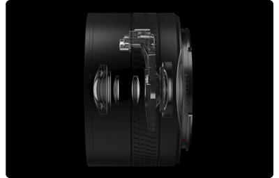 a moving image breakdown showing the moving focusing lens group on a black background