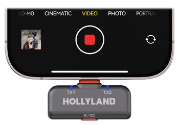 close up of the hollyland wireless microphone connected to the bottom of a smartphone