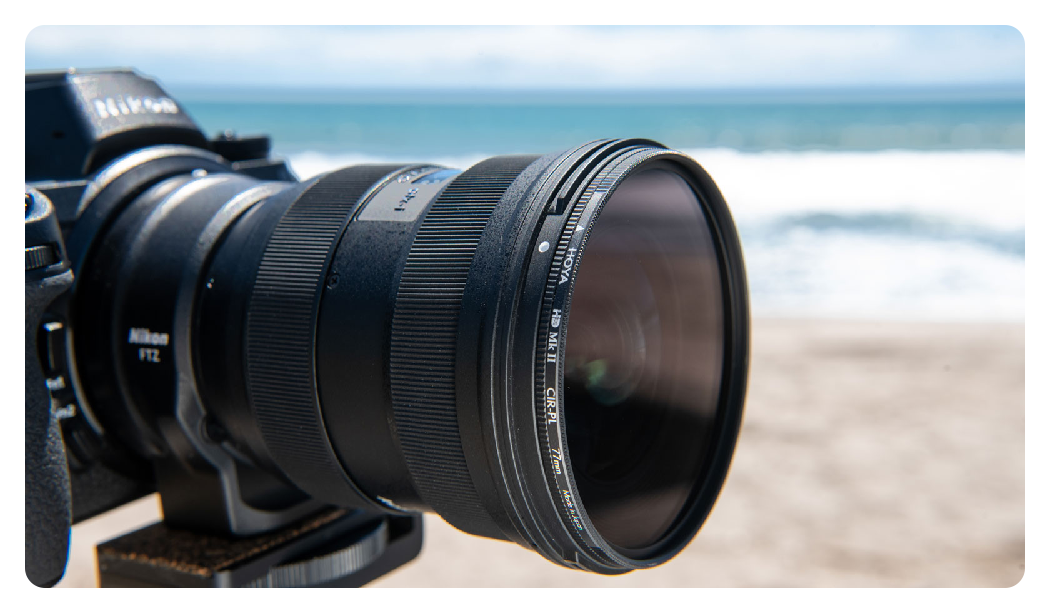 hoya 77mm hd mk ii cir-pl circular polarizing filter attached to a camera