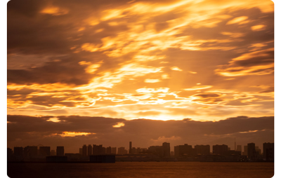 Sample photograph long exposure of city skyline at sunset
