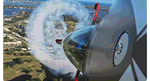 animated gif of stunt plane barrel rolling the air with insta360 ace pro mounted to its nose looking at the cockpit