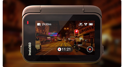 rear image of insta360 ace pro rear screen with image of tokyo city street at night