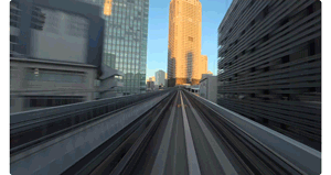 Animated gif of timeshift hyperlapse footage travelling along american monorail system between skyscrapers