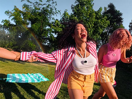 sample photograph women dancing in field