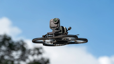 Insta360 GO Ultra action mount attached to a drone