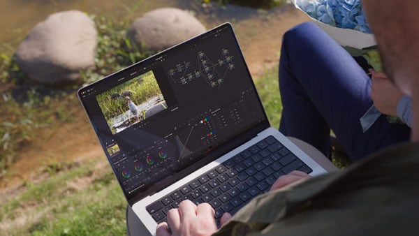 someone editing footage from the insta360 luna ultra on a laptop