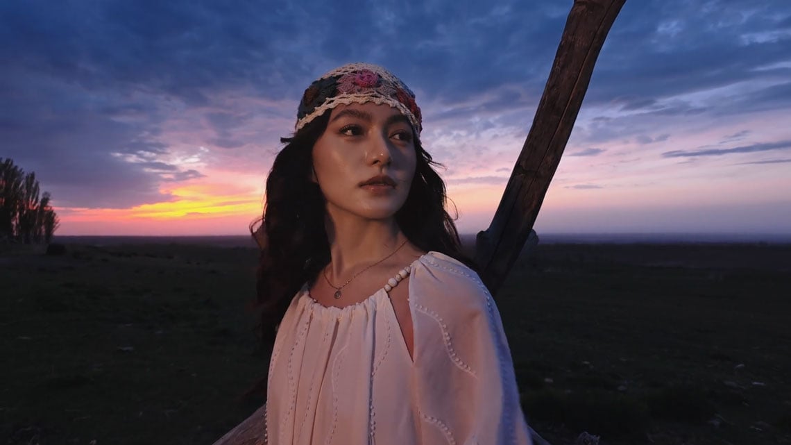 lowlight portrait of a woman at sunset