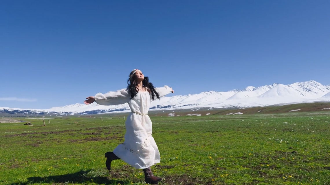 sample image of a woman running through a field