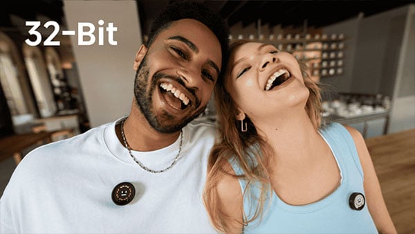2 people laughing while wearing the insta360 mic pro