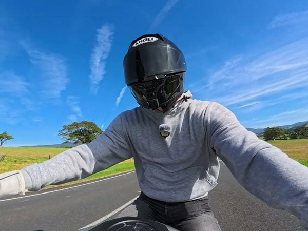 someone riding a motorbike using the mic pro