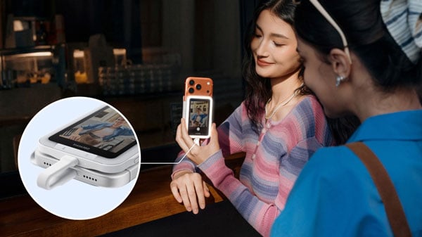 close up of the Insta360 Snap connected to a phone via usb-c