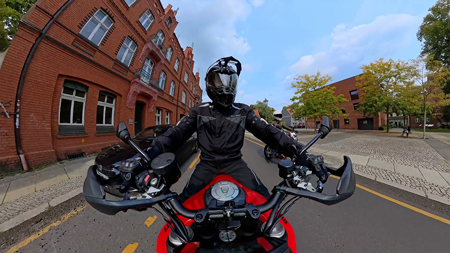someone on a motorbike using the insta 360 camera