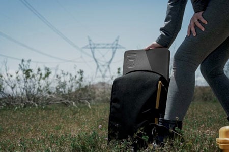 someone taking the iodyne Pro Data out of a backpack