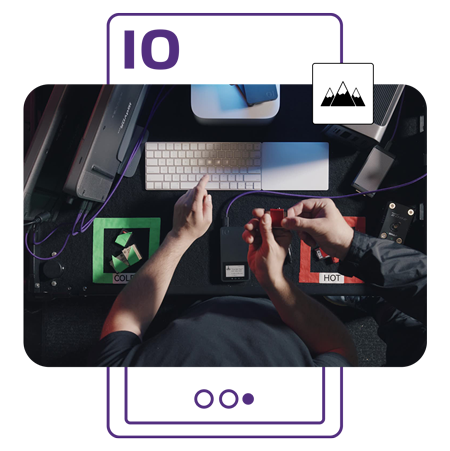 purple outline of the iodyne pro mini with a top down image of the drive connected to a pc