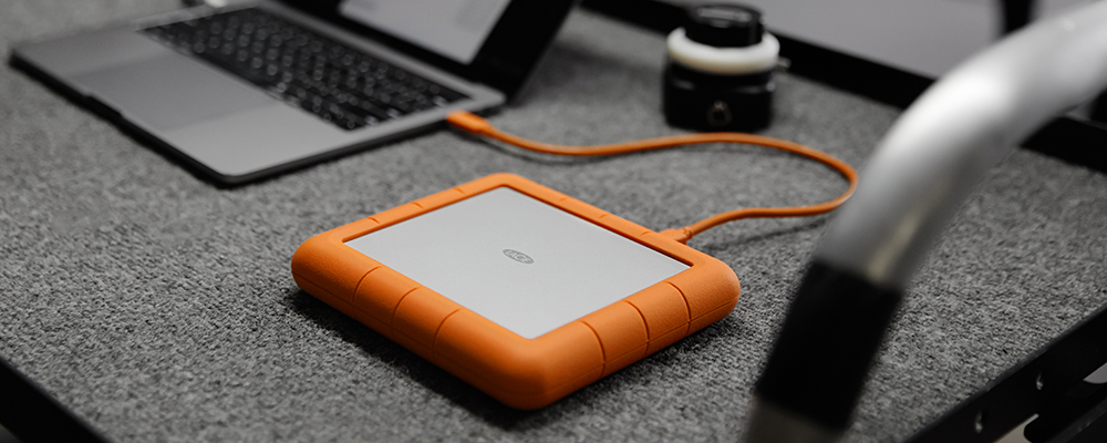 LaCie Rugged RAID Drive on DIT cart connected to macbook