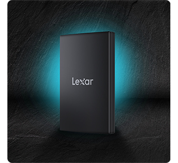 image of lexar armor 700 SSD on dark stone background highlighted by teal glow