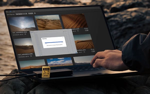 someone recovering data using the recovery tool on a laptop