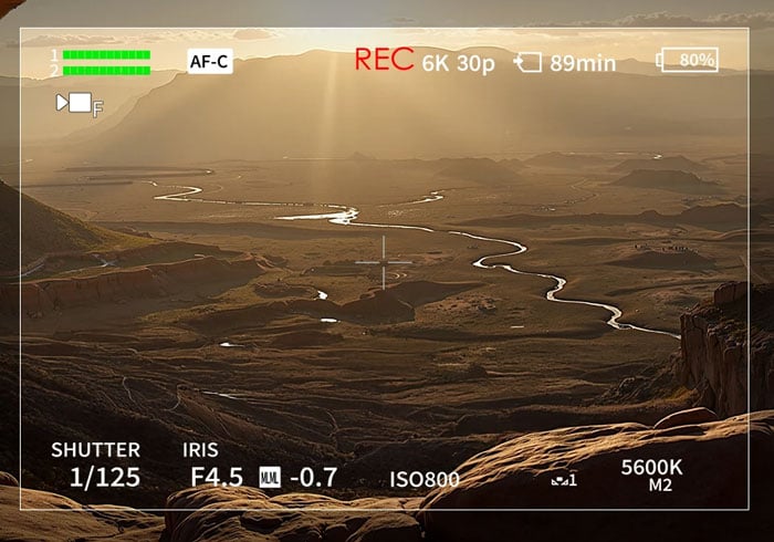 6k recording interface filming a sunset over a valley