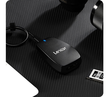 lexar professional CFexpress type B card reader sitting on carbon fibre table
