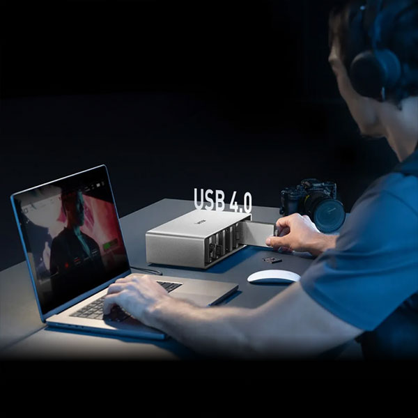 Lexar Professional Workflow modular dock and card reader system connected to a laptop