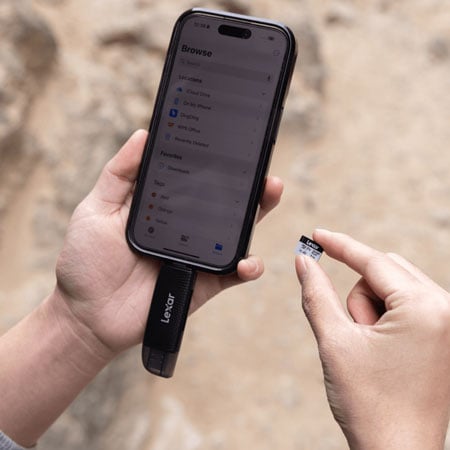 microsdxc card being inserted into a phone