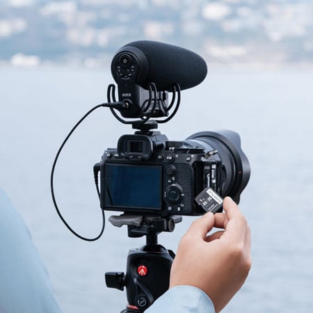sdxc card being inserted into a camera