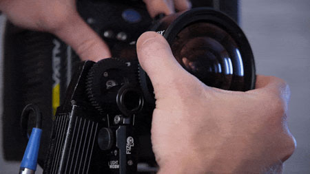 someone changing the lens using the FIZLock system