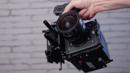 somone holding a camera using the FIZLock system