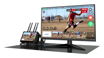 video camera monitor contected to a display on a desk