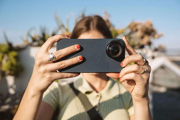 someone taking a photo using the fisheye lens