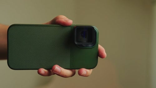 someone holding a smartphone in a moment case