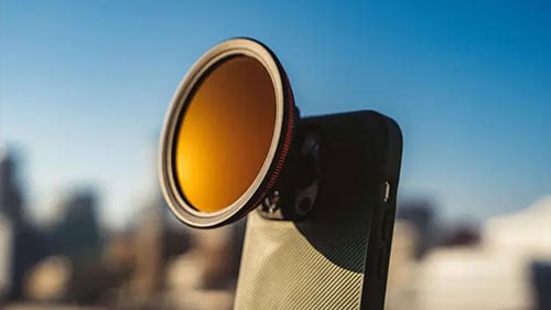 filter attached to a mobile leens using the moment case on a phone