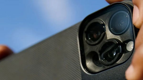 close up of someone holding a smartphone in the moment case