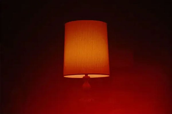 sample image of a lamp in a red room taken using the cinebloom filter