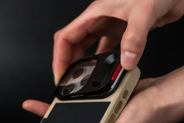 cinebloom filter being attached to a moment phone case