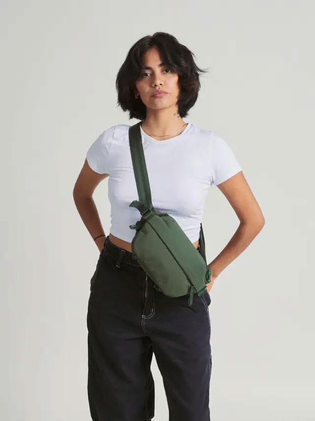 someone wearing the sling bag across their front