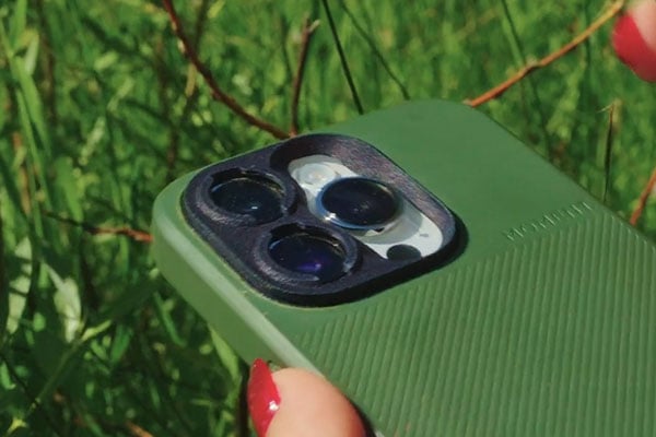 close up of a camera on a smartphone in a moment phone case