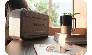 Nanlite FC-60B foam carry case sat on table with coffee cup
