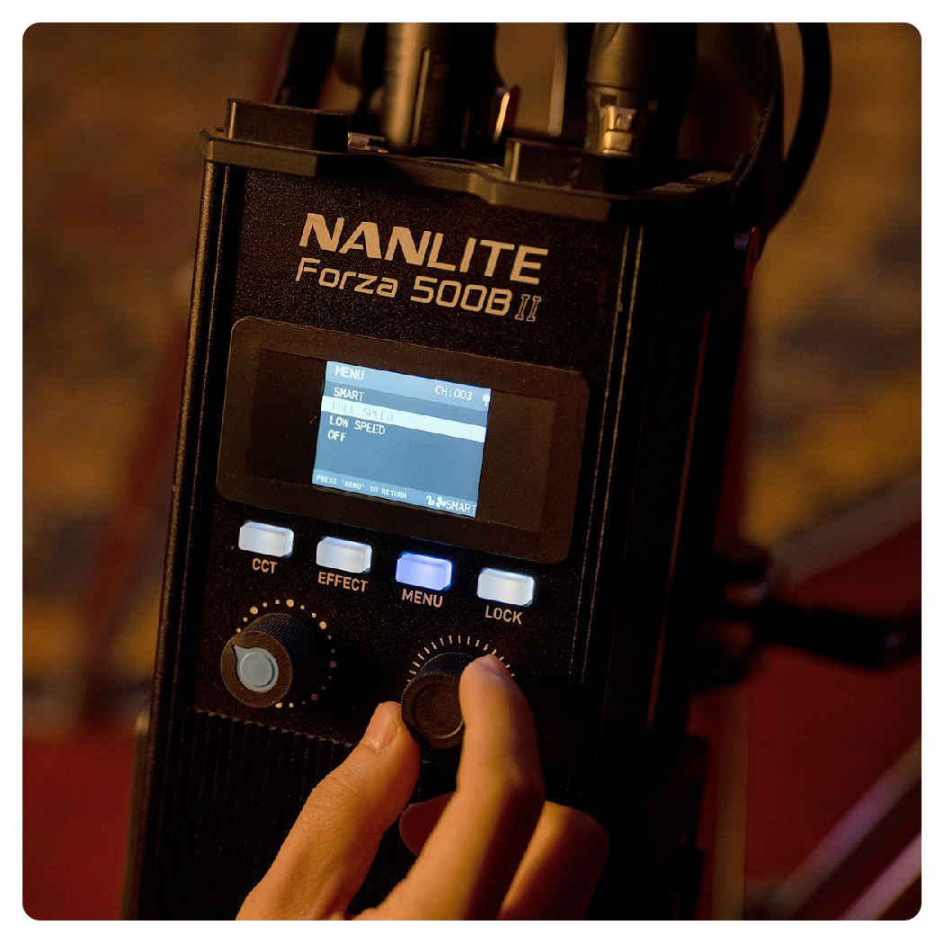 close up of someone adjusting the cooling settings of the nanlite forza 500bii