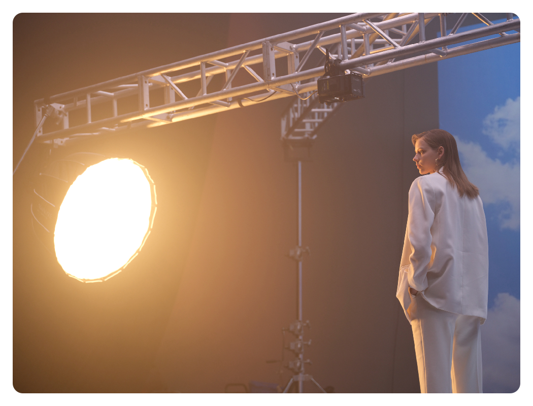 nanlite forza 500b ii in use in a studio with a woman in a suit under the light
