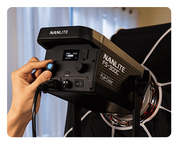 someone adjusting the nanlite fs300c effects