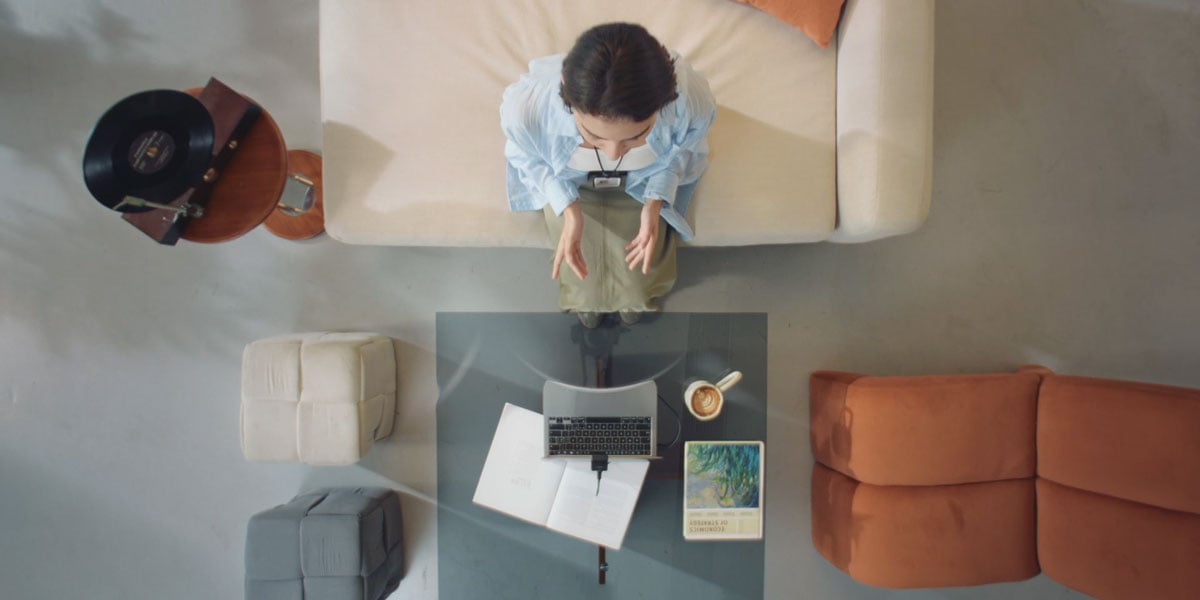 top down view of someone playing music while in a call using the obsbot webcam