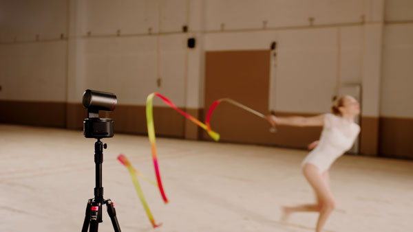 dancer with a yellow and red ribbon being tracked using the ptz with the pan axis locked