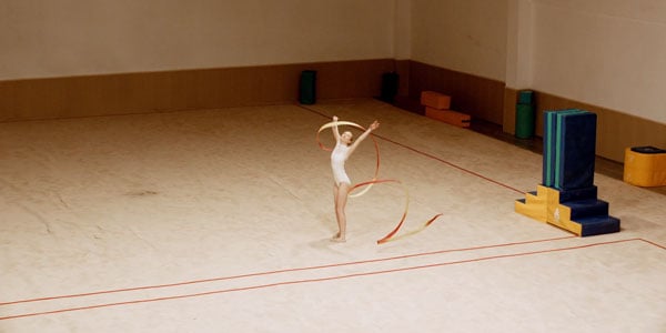 example image of a dancer with a yellow and red ribbon