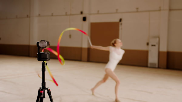 dancer with a yellow and red ribbon being tracked using the ptz with the tilt axis locked