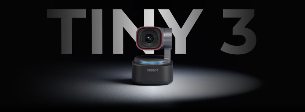 obsbot tiny under a spot light on a black background