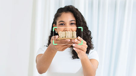 auto focus example of a woman holding an ornament using the obsbot tiny se