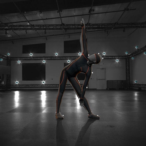 a model wearing a motion capture suit in a studio