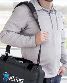 Person carrying OWC Jellyfish Nomad Carry case on shoulder Strap